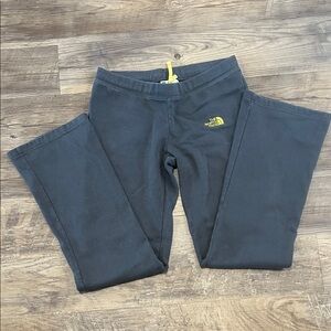The North Face Charcoal sweatpants with Yellow Logo